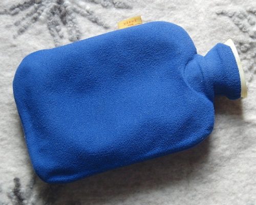 how to save on utility bills this winter - purchase a hot water bottle