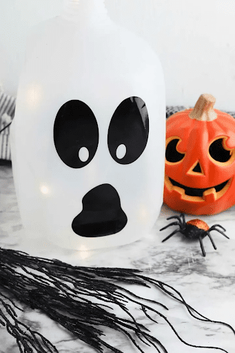 cheap diy halloween decorations - milk jug ghouls