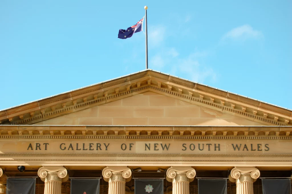 Close up of the entrance of the Art Gallery of New South Wales with the Australian flag on top